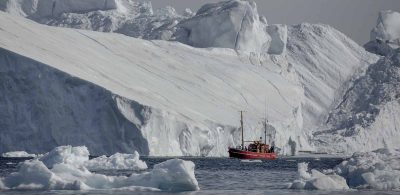 A Tour Boat Among Huge Icebergs At The Ilulissat Ice Fjord In Greenland - Photographer: Mads Pihl - Visit Greenland